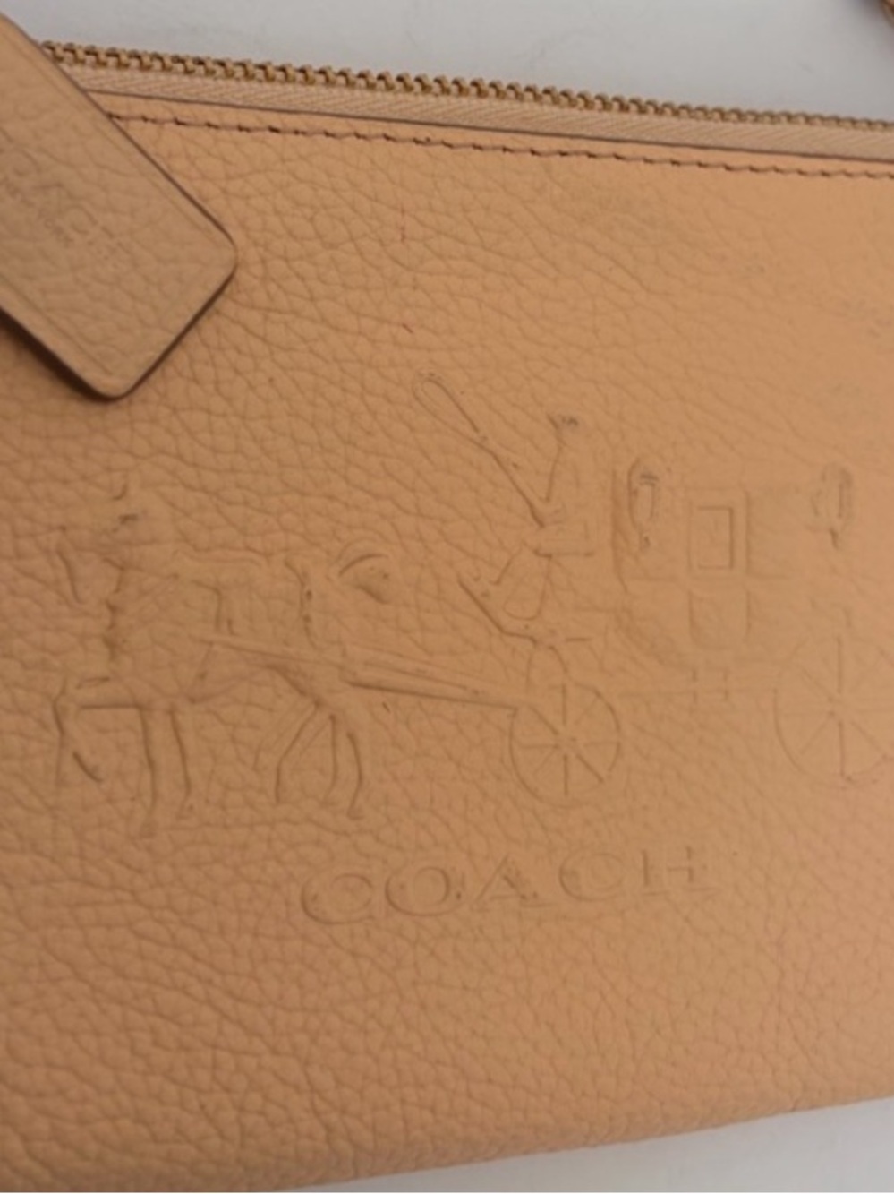 Coach Pebbled Leather Wristlet in Peach